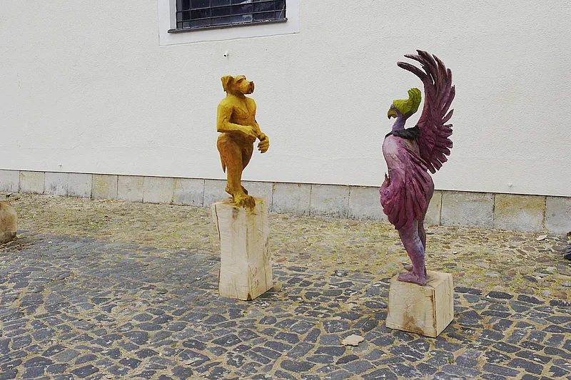 Two figures on the square